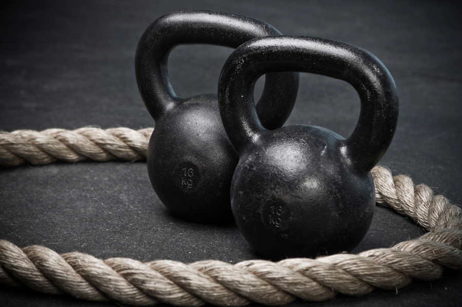 kettlebells with workout rope on the ground